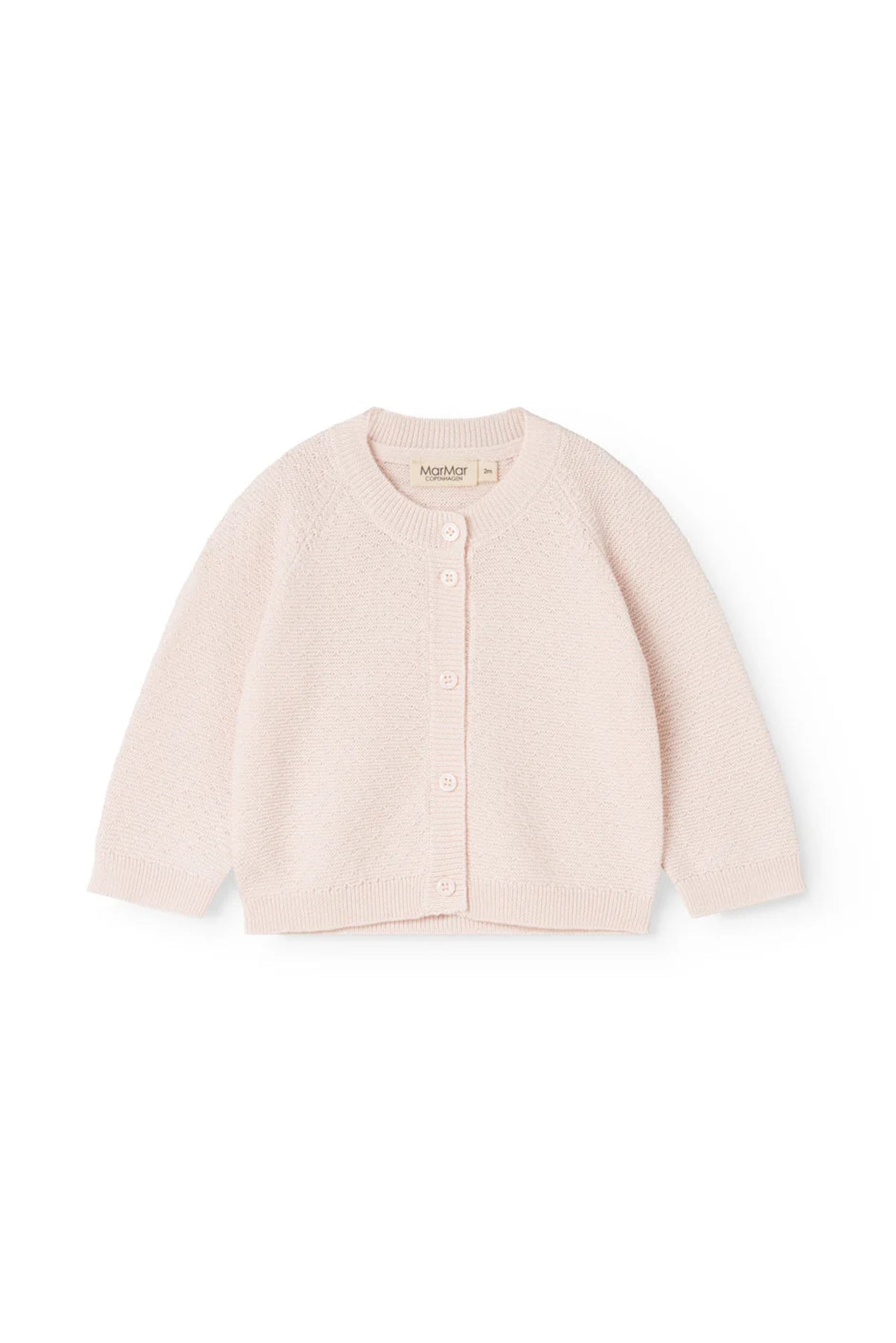 Pink baby cardigan on a white background