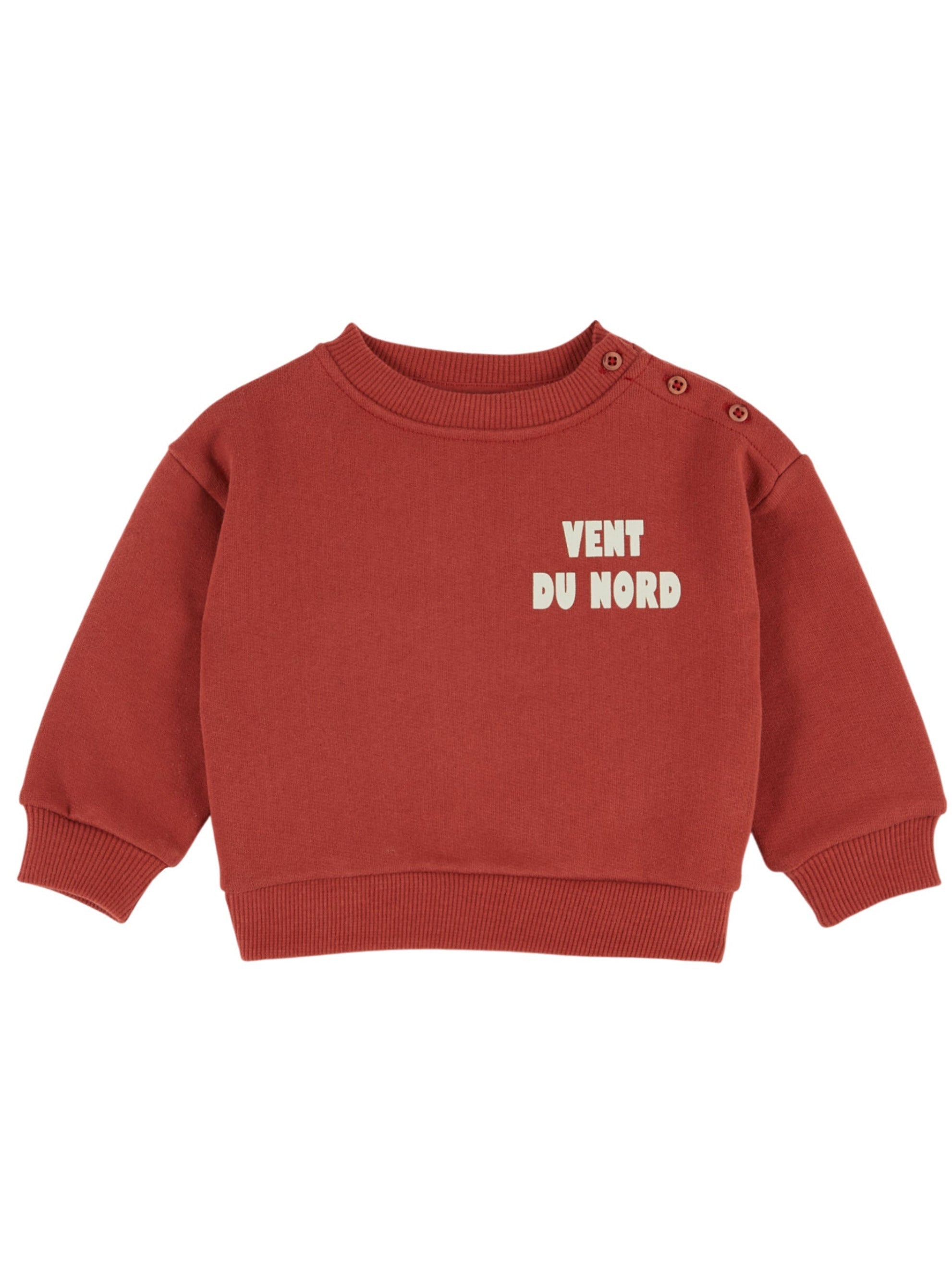 A terracotta red long-sleeve baby sweatshirt with 'VENT DU NORD' printed in white on the chest, featuring shoulder snap buttons, shown on a plain white background.