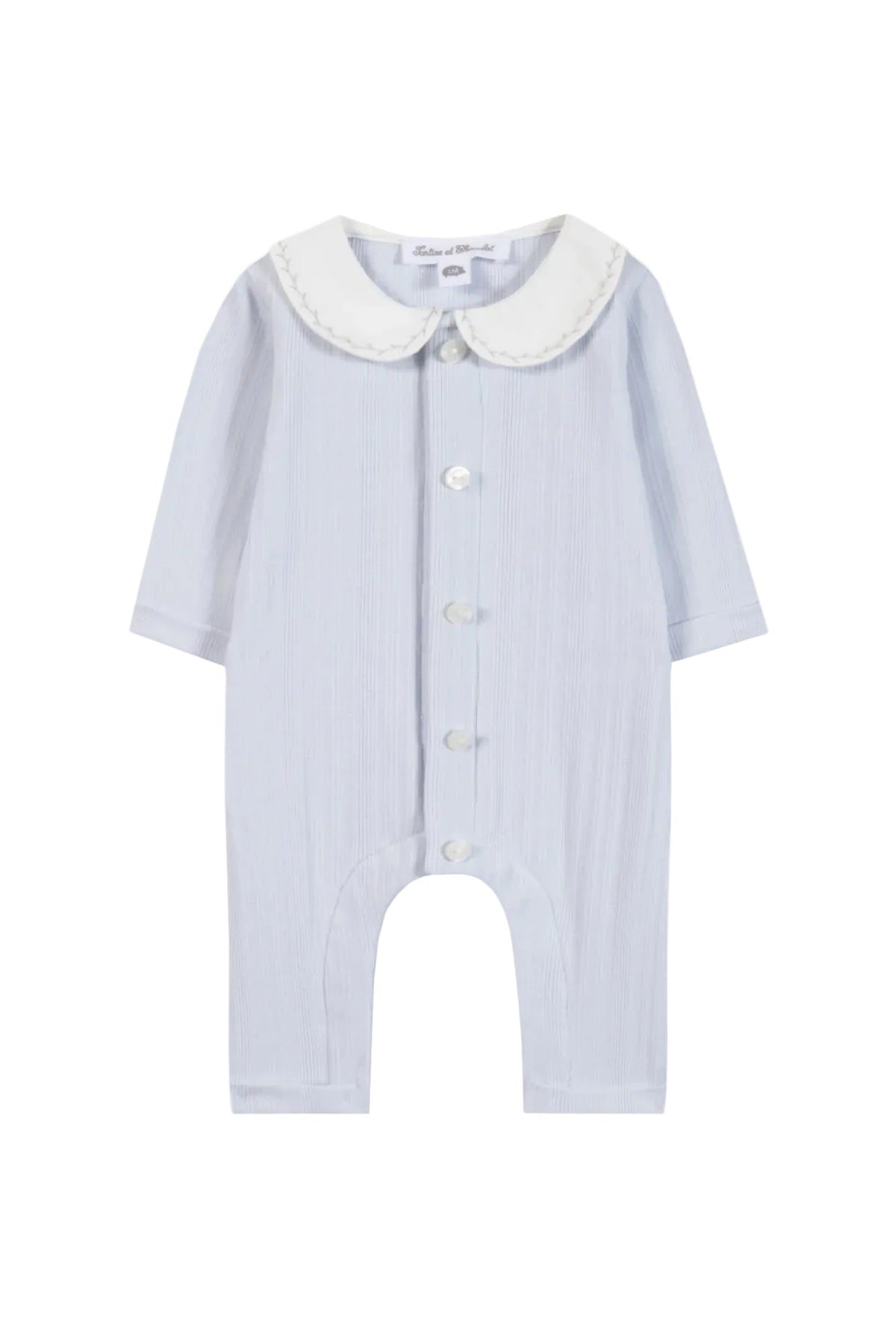 Baby romper with button details on a white background