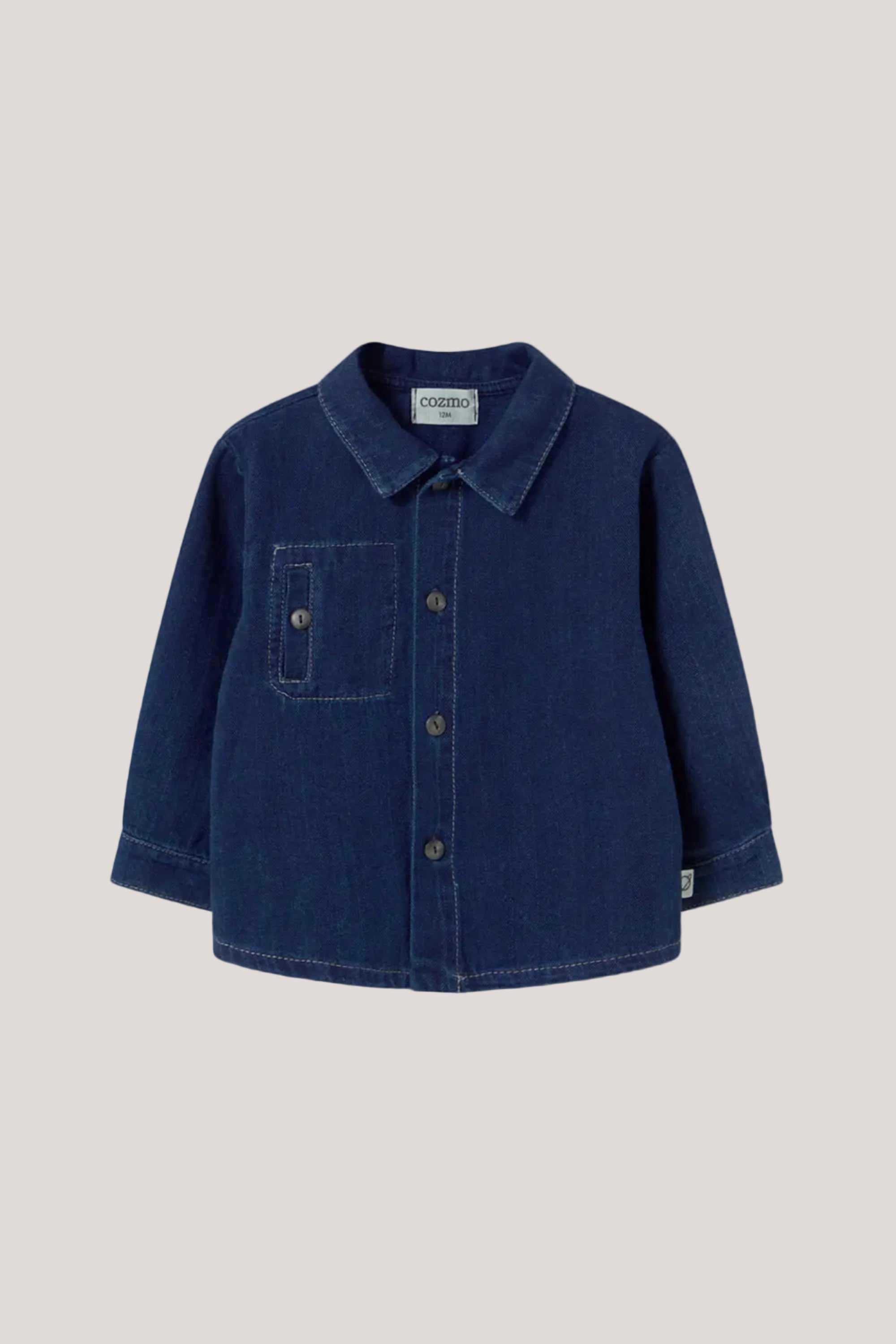 Blue denim shirt on a light gray background