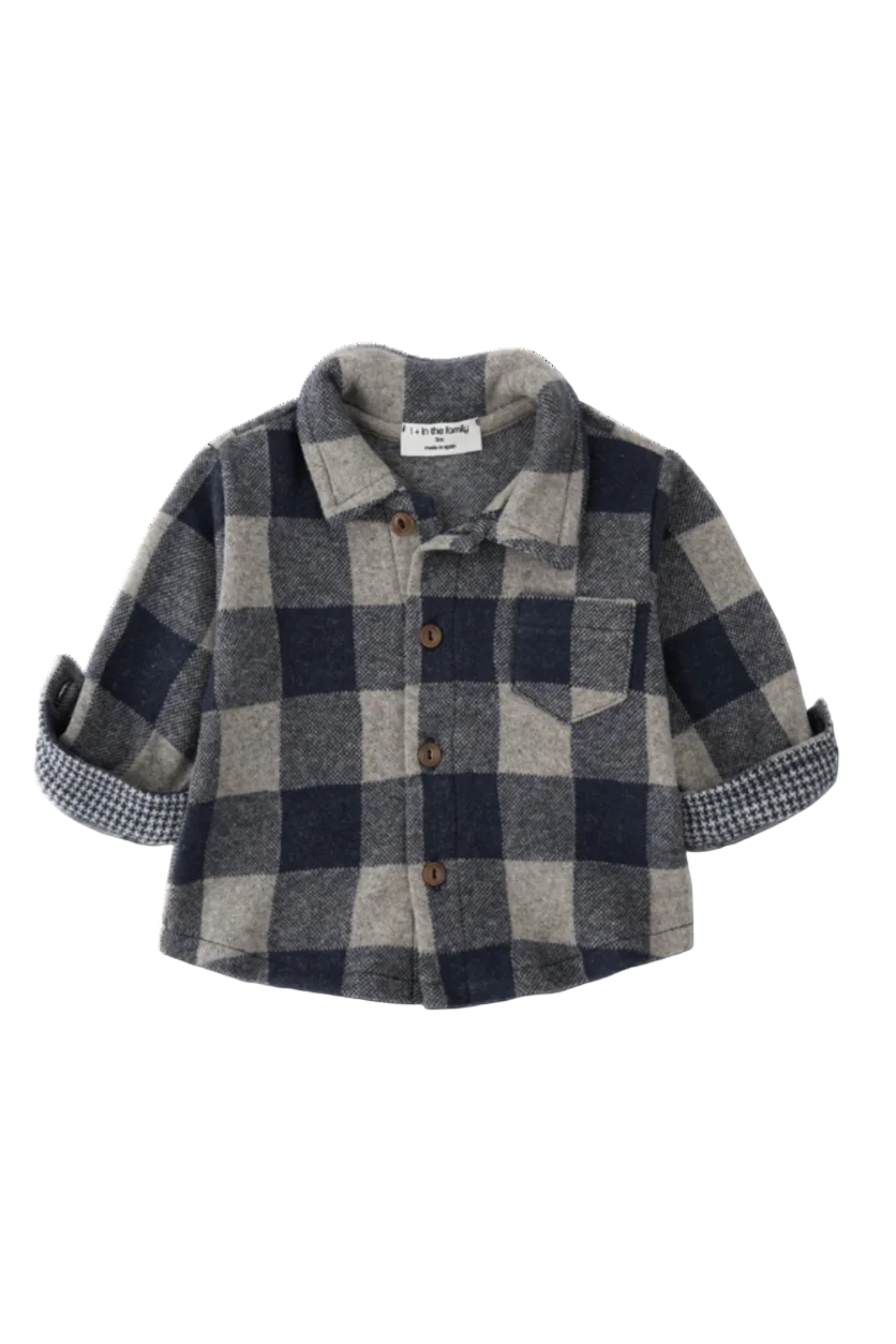 Plaid shirt with rolled-up sleeves on a white background