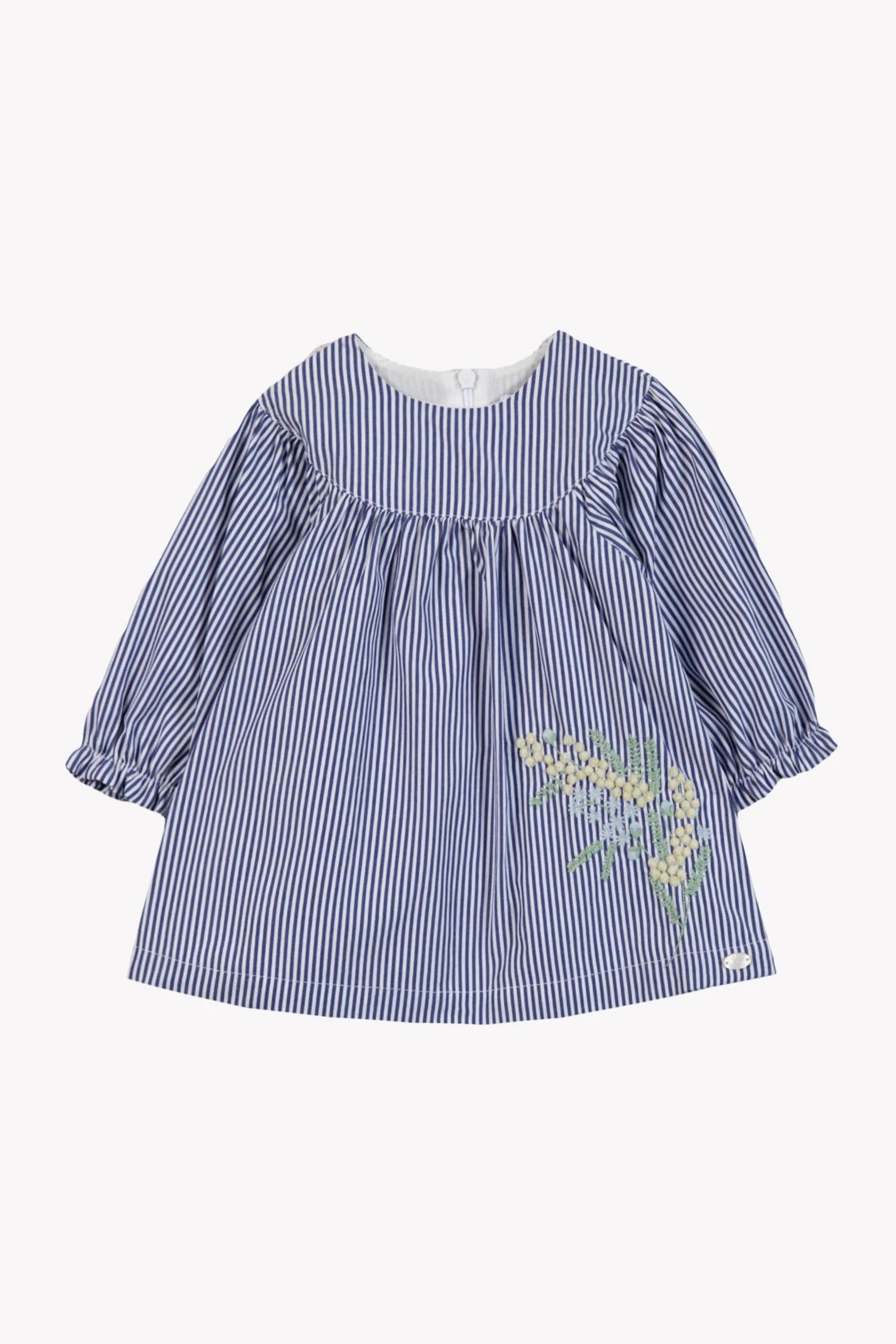 Blue and white striped dress with floral embroidery on a white background