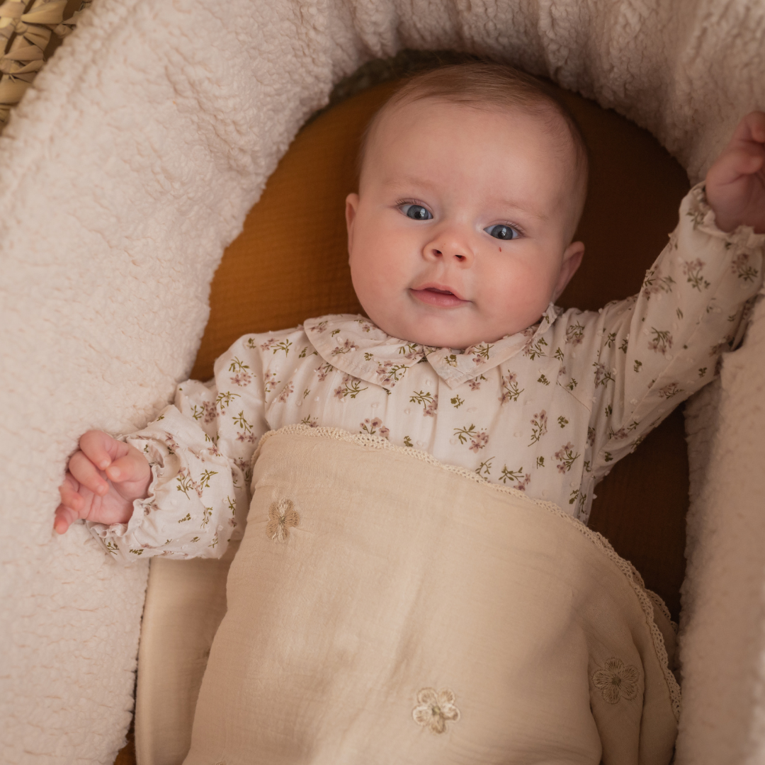 Flower embroidered blanket