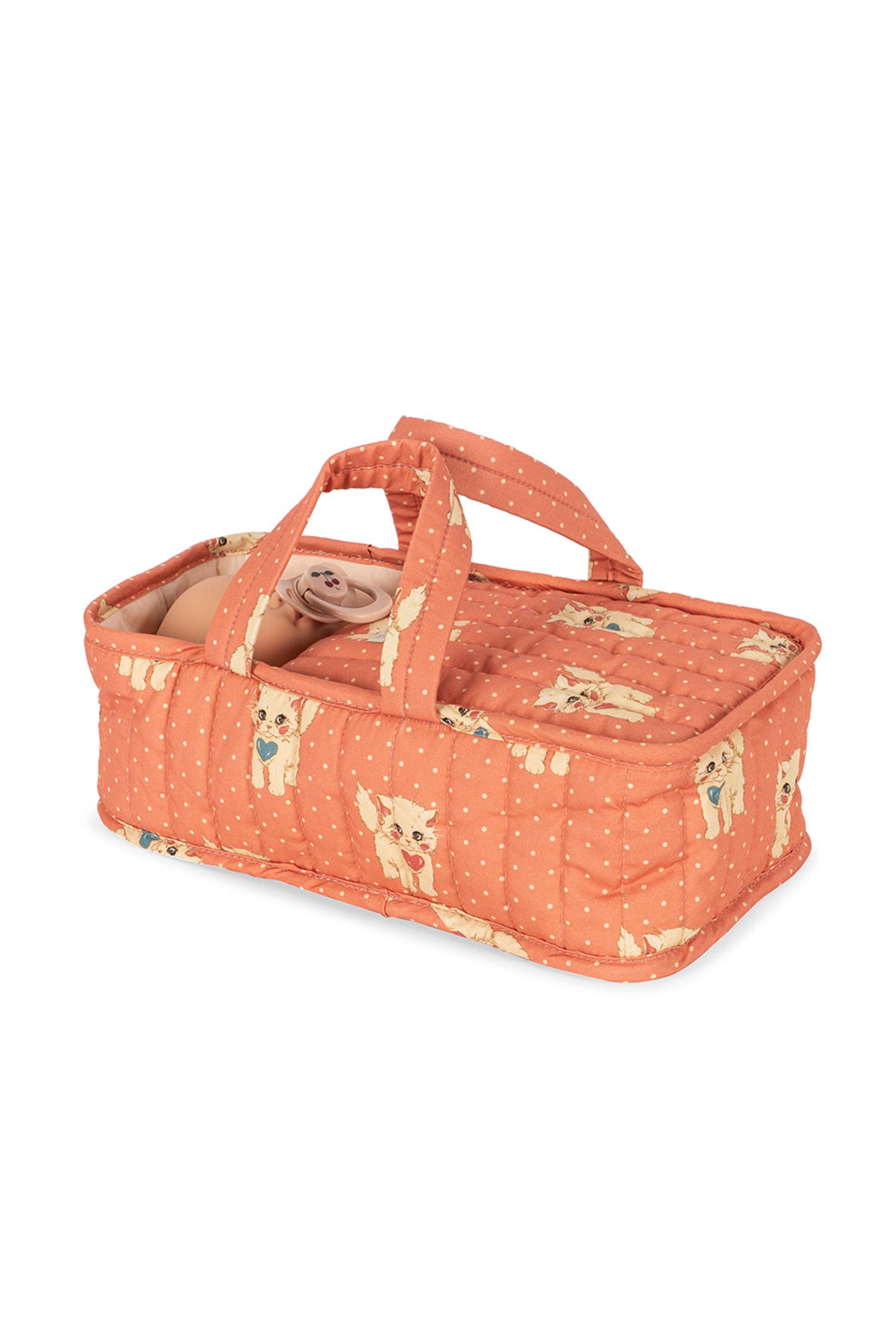 Orange quilted baby bassinet with animal pattern on a white background