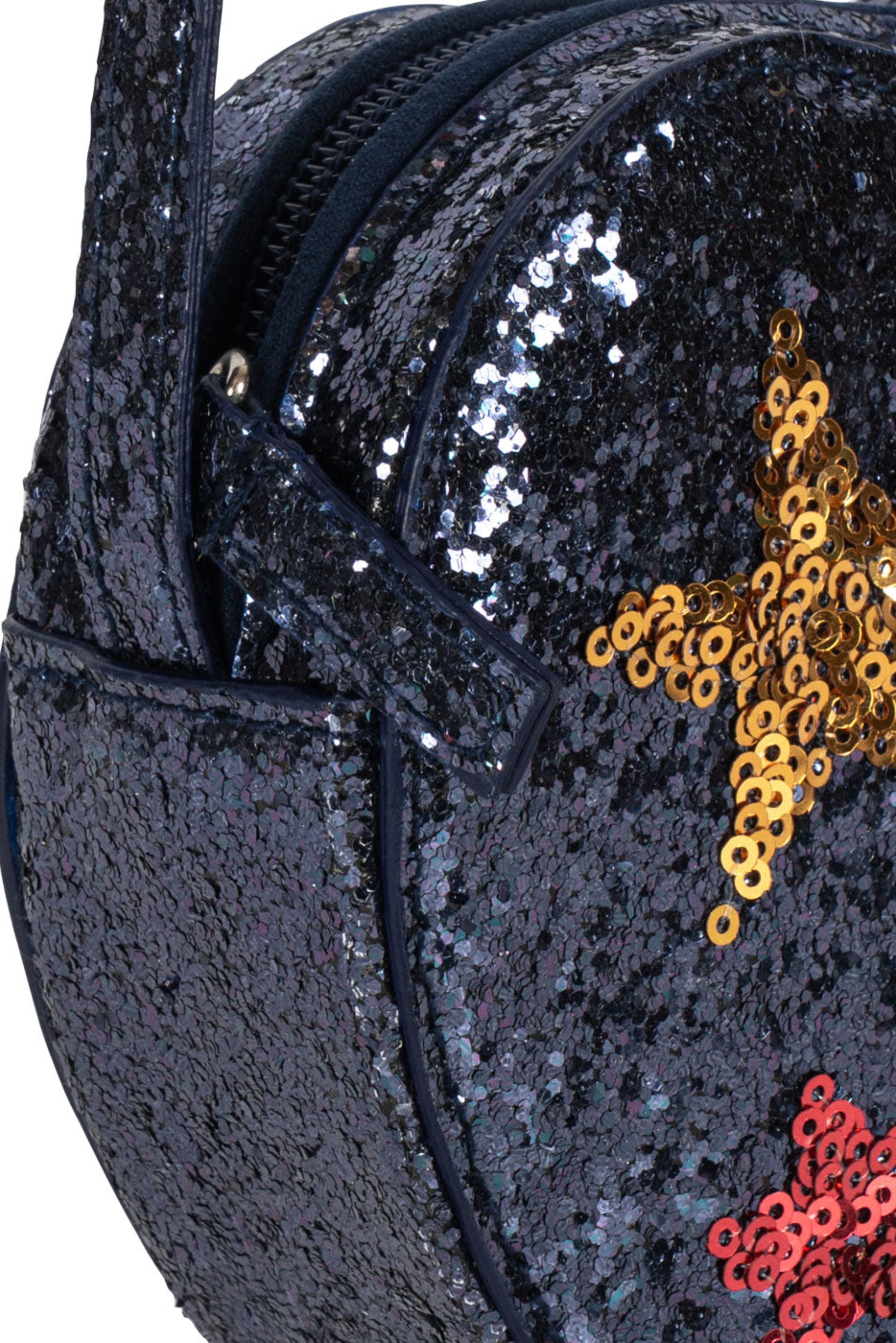 Close-up of a black sequined bag with a gold sequin star and a red sequin star applique on a white background.