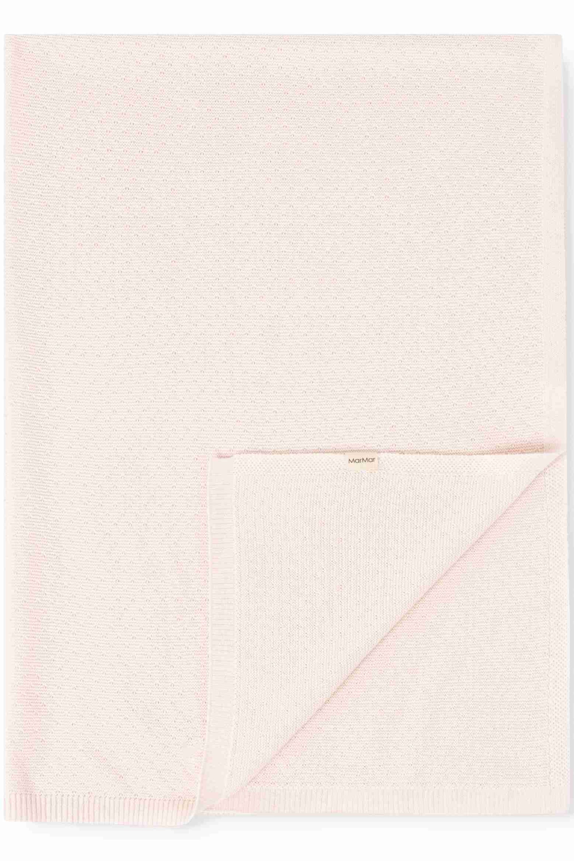 Light pink knit blanket
