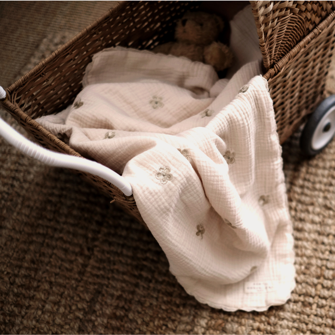Flower embroidered blanket