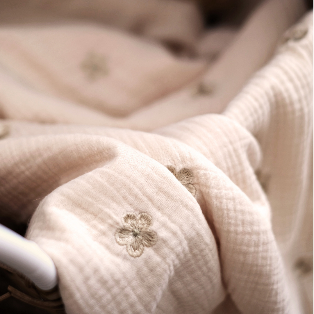 Flower embroidered blanket