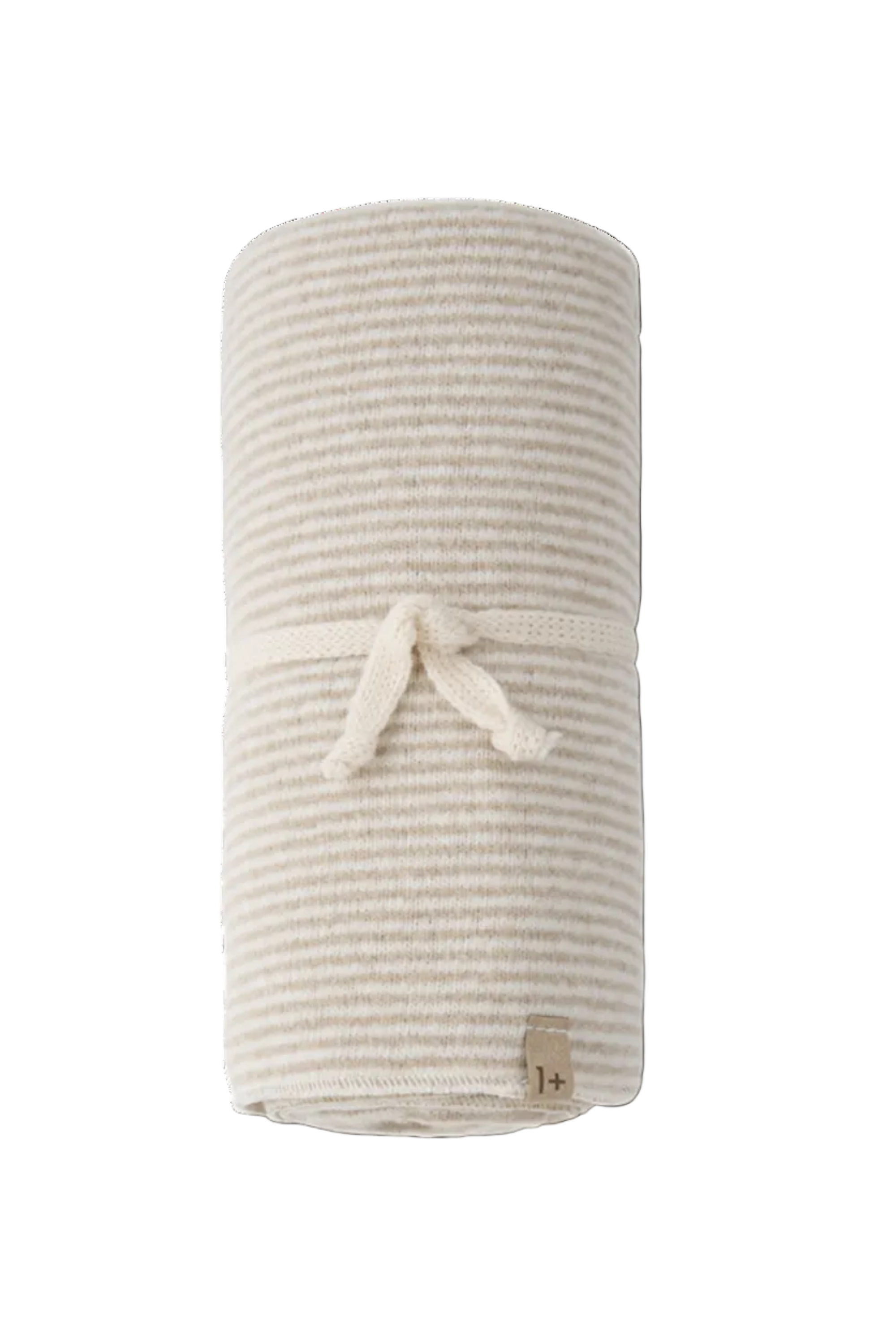 A rolled-up cotton muslin blanket with fine beige and off-white horizontal stripes, tied with a matching fabric bow and featuring a small wooden brand tag.