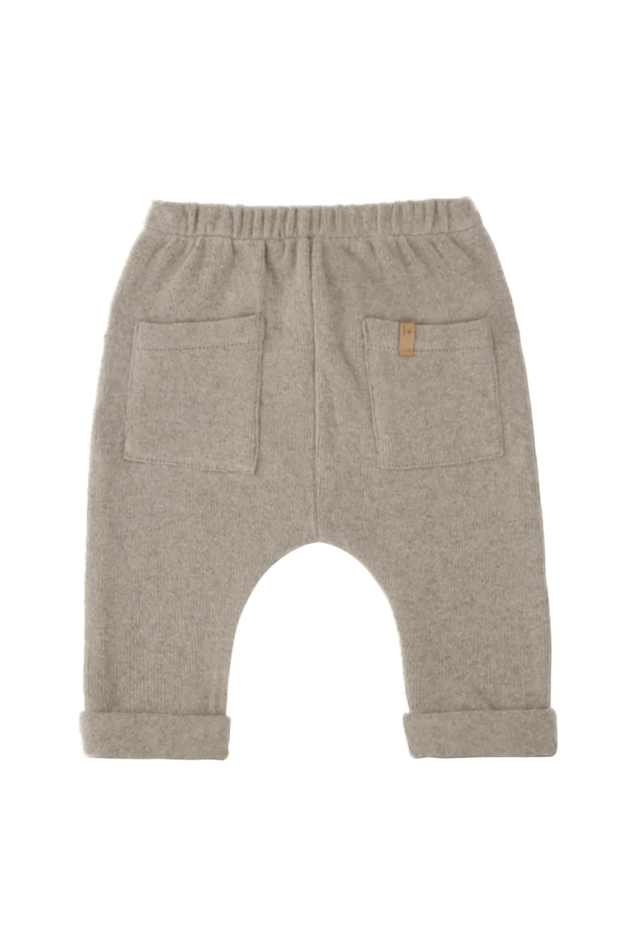 Back view of tan kids pants / joggers