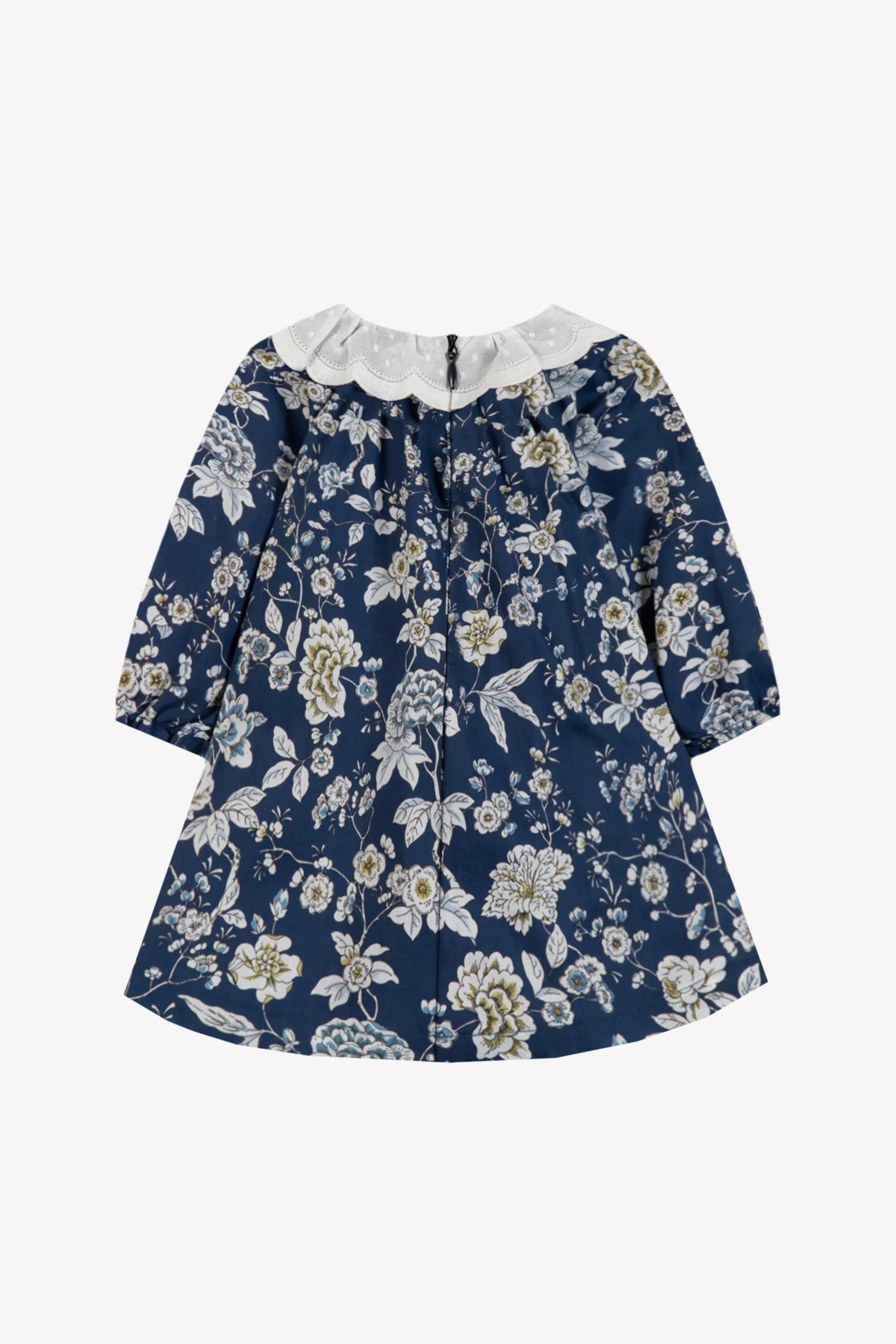 A navy blue long-sleeve dress with a white floral print and a contrasting white ruffled collar, shown flat against a light gray background.