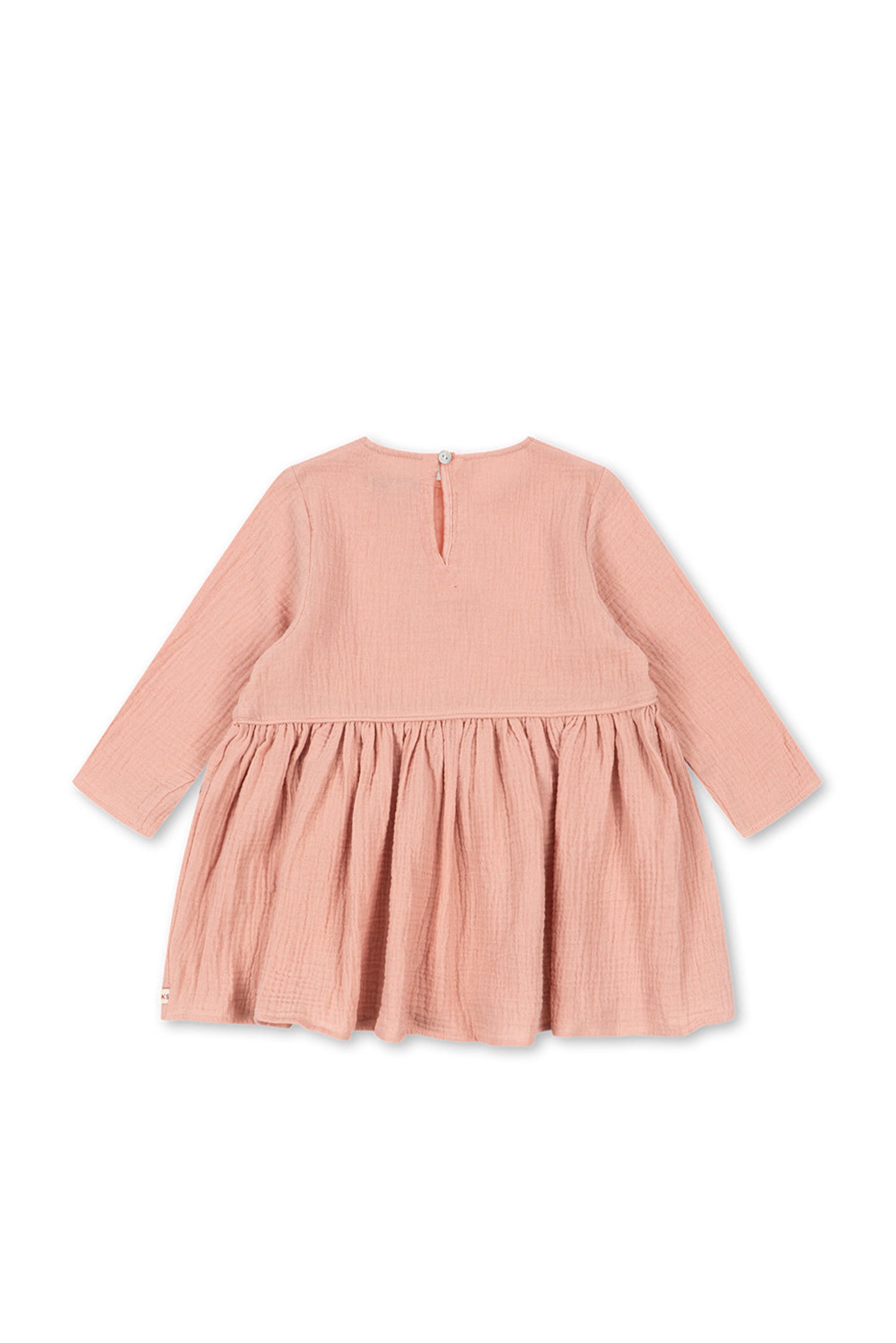 Pink dress with long sleeves on a white background
