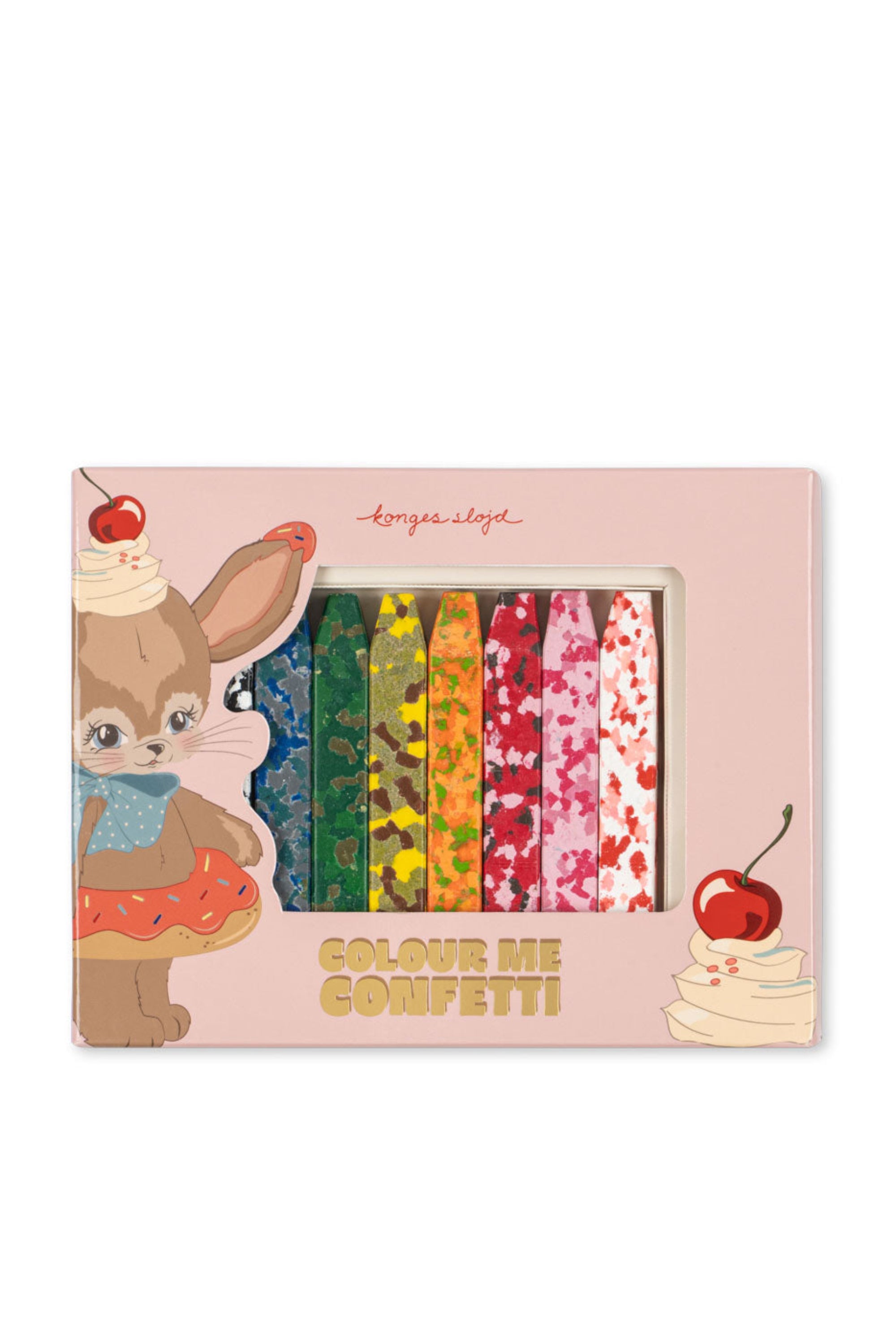 A boxed set of crayons in pastel pink packaging with cartoon bunny illustrations and the text 'COLOUR ME CONFETTI'. The crayon window shows multiple crayon colors including blue, green, yellow, orange, pink, and red.